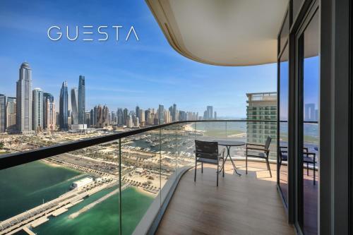 a balcony with a view of the city at Emaar Beachfront - Marina Vista Tower, Dubai Marina in Dubai