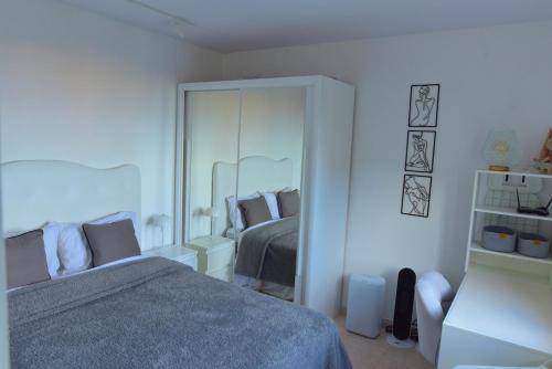 Postel nebo postele na pokoji v ubytování Casa da Vista Infinita