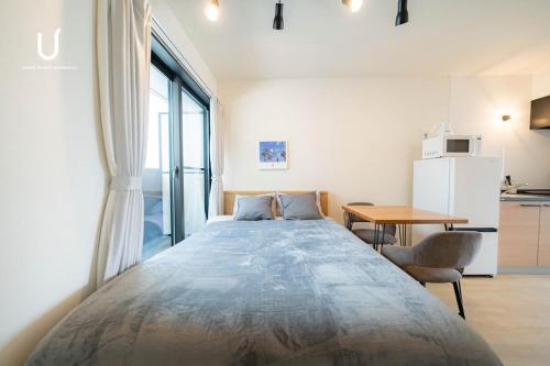 Kuchyň nebo kuchyňský kout v ubytování unito residence HAKATA Port 201