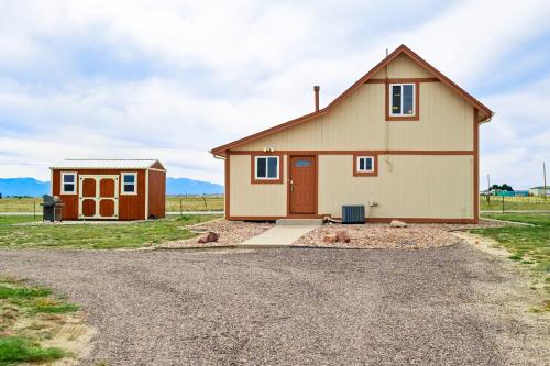 a house on the side of a road at 10457 Elbert in Peyton