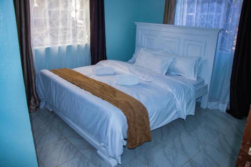 Voodi või voodid majutusasutuse Cozy styles and homes toas