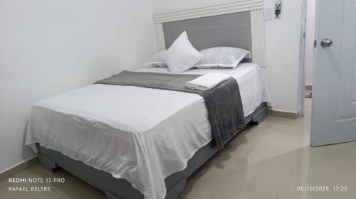 Postel nebo postele na pokoji v ubytování Hotel en Pedernales