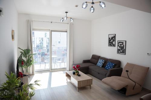 Posezení v ubytování Stylish 1BR Near SeaWorld & Yas Attractions