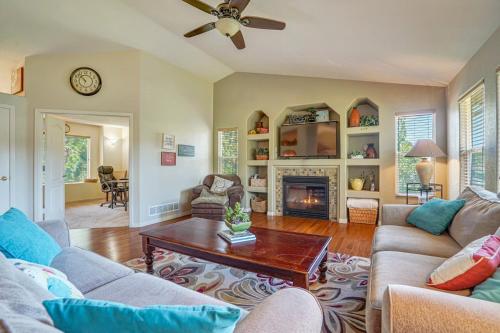 a living room with two couches and a fireplace at 120 Winding Meadow in Monument