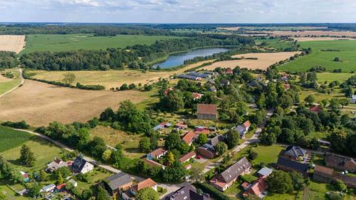 an aerial view of a village with a river at Wiesengrund in Cantnitz