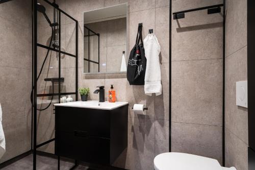 Ванная комната в Guestly Homes - Modern & Central 1BR