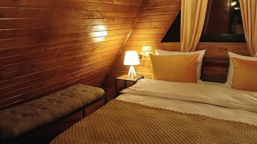 Un ou plusieurs lits dans un hébergement de l'établissement Donata Cottages kazbegi