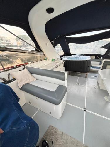 a seat in the back of a boat at Boat with Jacuzzi - Bateau avec Jacuzzi in Mandelieu-la-Napoule
