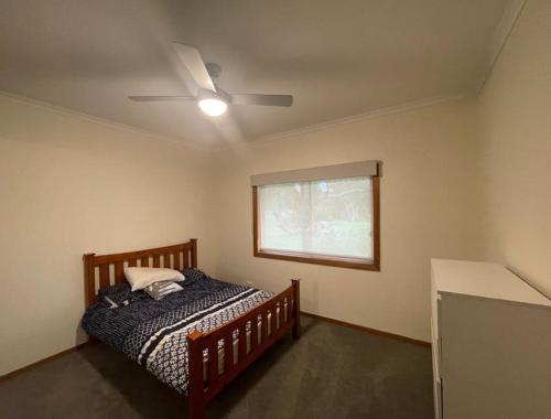 Ένα ή περισσότερα κρεβάτια σε δωμάτιο στο Gardner Country Manor