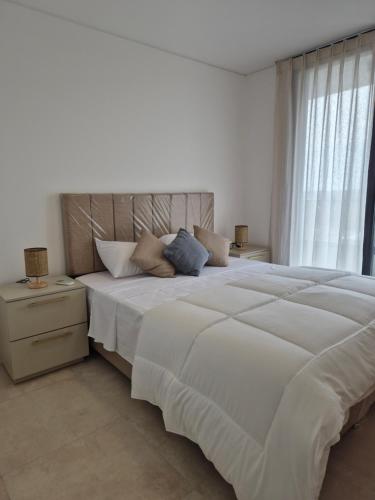 Ένα ή περισσότερα κρεβάτια σε δωμάτιο στο Feel 2 habitaciones