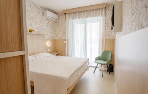 Ένα ή περισσότερα κρεβάτια σε δωμάτιο στο Hotel Paistos Paestum