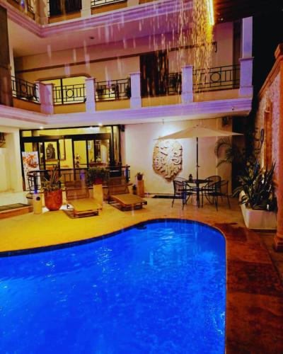 Bazén v ubytování Hotel Residencial nebo v jeho okolí
