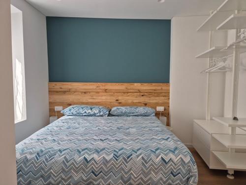 Ένα ή περισσότερα κρεβάτια σε δωμάτιο στο RosAlpina