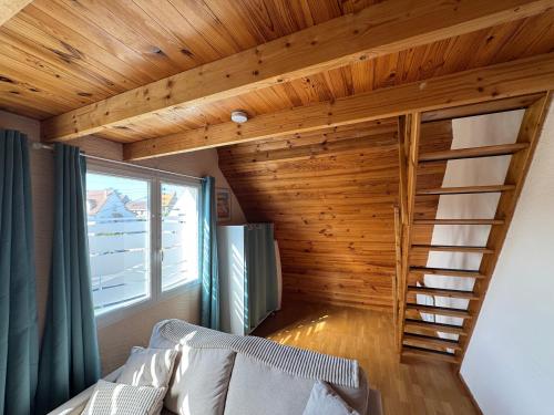 Ένα ή περισσότερα κρεβάτια σε δωμάτιο στο Parenthèse marine - Le Portel