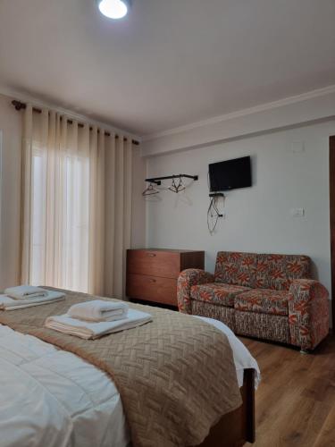 Una cama o camas en una habitación de Hotel Vienna