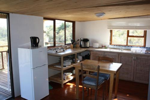 Η κουζίνα ή μικρή κουζίνα στο The Potters Hut