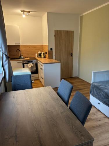 Η κουζίνα ή μικρή κουζίνα στο Apartmány Borovice