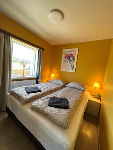 Postel nebo postele na pokoji v ubytování Árbakki-Guesthouse near Egilsstaðir