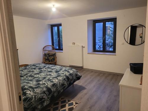 En eller flere senger på et rom på Maison rénovée