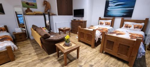 Voodi või voodid majutusasutuse Scafell Cottage on The Big "W" Ranch toas