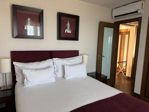 Postel nebo postele na pokoji v ubytování Hotel Vila Galé Cascais T1 542