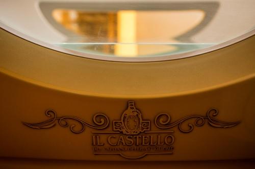 a close up of a coffee cup with a sticker on it at Castello del Capitano delle Artiglierie in Castrocaro Terme