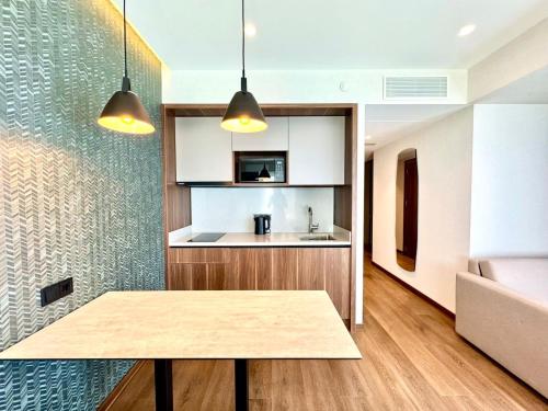 Køkken eller tekøkken på Sunshine apartments in Alliance Privilege