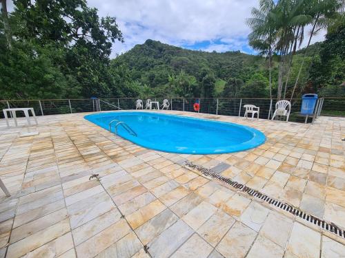 Swimmingpoolen hos eller tæt på Casa em Domingos Martins condomínio com piscina