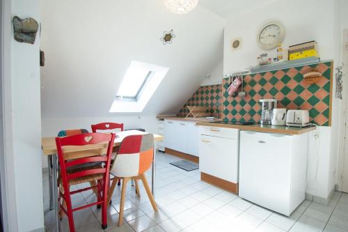 Kuchyň nebo kuchyňský kout v ubytování Le Correjou I Magnifique vue mer & Plage