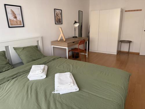 Ένα ή περισσότερα κρεβάτια σε δωμάτιο στο Apartament Słoneczny