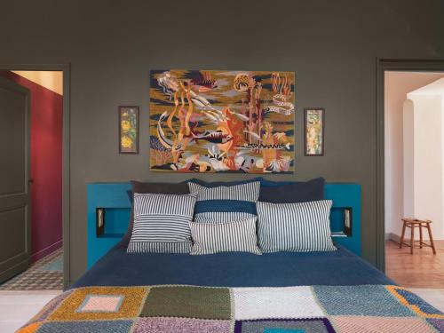 Ένα ή περισσότερα κρεβάτια σε δωμάτιο στο A la maison en medoc