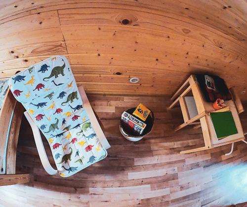 an inside view of a play house with a bed in it at Domki Sielankowo in Odargowo