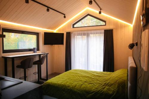 Ένα ή περισσότερα κρεβάτια σε δωμάτιο στο Skywood