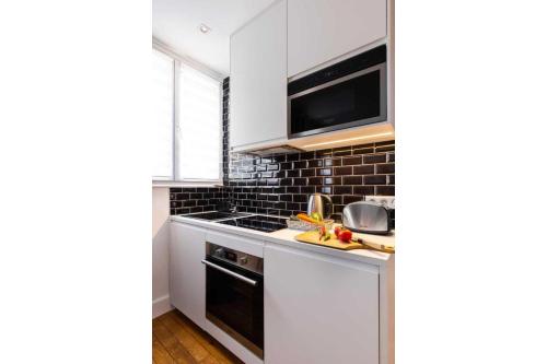 Kuchyň nebo kuchyňský kout v ubytování Modern apartment 2BR 6P – Nogent-sur-Marne