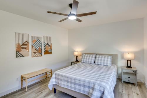 a bedroom with a bed and a ceiling fan at Luxe, New-Build Sturgis Retreat with Mountain Views in Crook City