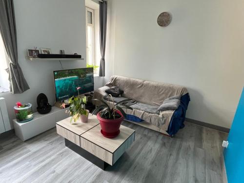 Χώρος καθιστικού στο Chambre confortable chez habitant