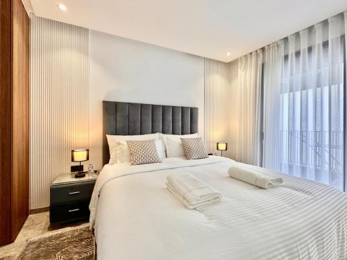 Ένα ή περισσότερα κρεβάτια σε δωμάτιο στο Calm Studio in Oasis, Near Train Station