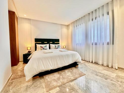 Ένα ή περισσότερα κρεβάτια σε δωμάτιο στο Oasis Studio - Parking, Fiber, Near the Station