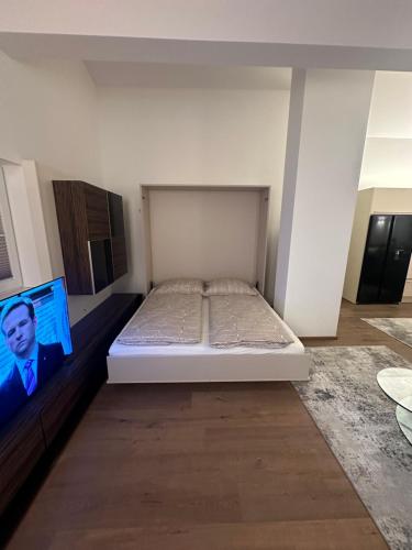 Ένα ή περισσότερα κρεβάτια σε δωμάτιο στο Leos Suite Appartement