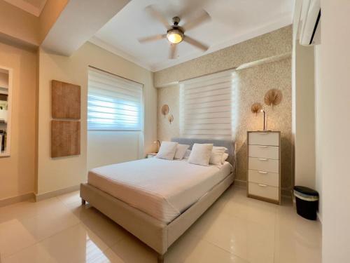 Postel nebo postele na pokoji v ubytování Acogedor apartamento ÁGORA MALL