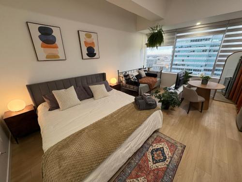 Ένα ή περισσότερα κρεβάτια σε δωμάτιο στο Studio Downtown , Rodgers Views, AC, Heated Free Underground Parking