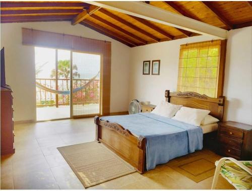 Postel nebo postele na pokoji v ubytování Tu paraíso frente al mar te espera en Santa Verónica