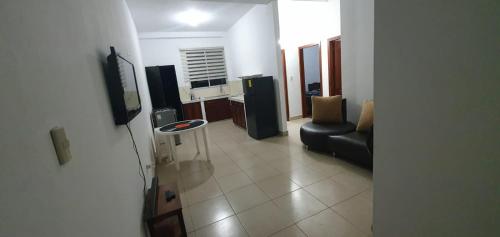 TV a/nebo společenská místnost v ubytování Macas Comfort Apartment