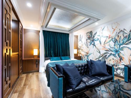 Ένα ή περισσότερα κρεβάτια σε δωμάτιο στο Tabist Manis RESORT VILLA