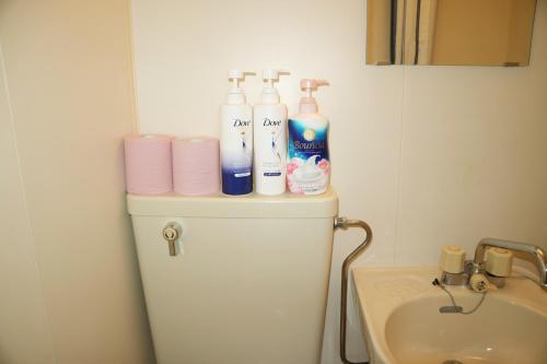 a bathroom with toiletries on top of a refrigerator at Joynas Ise / Vacation STAY 32706 in Ise
