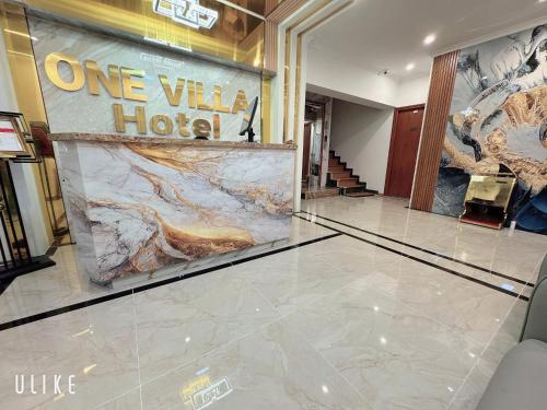 a lobby of a hotel with a glass floor at One Villa Hotel 6 in Long Biên