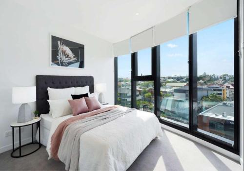 Ένα ή περισσότερα κρεβάτια σε δωμάτιο στο FV Peppers Brisbane