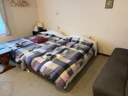 Cama o camas de una habitación en 箱根エレガンス