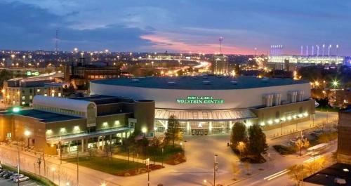 a large building in a city at night at Downtown Loft Free Street Parking Gym w Sauna in Cleveland