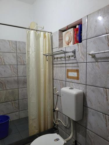 Koupelna v ubytování Akalapuzha Homestay